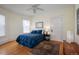 Comfortable bedroom featuring a ceiling fan, hardwood floors, and a cozy, inviting atmosphere at 1817 - 1821 Vine Vine St, Denver, CO 80206