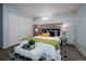 Bedroom with brick wall accents, bright lighting, and ample storage at 1817 - 1821 Vine Vine St, Denver, CO 80206