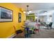 Dining area with colorful accents, plenty of natural light, and an open layout at 1817 - 1821 Vine Vine St, Denver, CO 80206