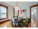 Elegant dining room with hardwood floors, stylish lighting, and modern artwork at 1817 - 1821 Vine Vine St, Denver, CO 80206