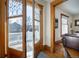 Open doorway leading to a balcony, connecting indoor living space with outdoor views at 1817 - 1821 Vine Vine St, Denver, CO 80206