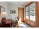 Charming entryway featuring hardwood floors, decorative windows, and a wooden door at 1817 - 1821 Vine Vine St, Denver, CO 80206