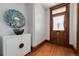 Entryway featuring hardwood floors, white accents, and unique decor at 1817 - 1821 Vine Vine St, Denver, CO 80206