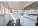 Sun-filled laundry room with a washer, dryer, and lots of natural light at 1817 - 1821 Vine Vine St, Denver, CO 80206