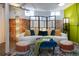 Cozy living area with a stylish sofa, exposed brick, and ambient lighting at 1817 - 1821 Vine Vine St, Denver, CO 80206