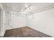 Unfinished basement with concrete floors, white walls, and natural light from the above-ground windows at 1422 Ivy St, Denver, CO 80220