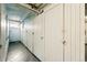 Basement hallway with storage areas at 1422 Ivy St, Denver, CO 80220
