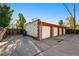 Detached garages are in the back and behind a fence at 1422 Ivy St, Denver, CO 80220