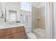 Bathroom with sleek vanity, modern fixtures, and shower-tub combo at 8711 E Hampden Ave # 21, Denver, CO 80231