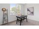 Well-lit office with a modern desk and large window at 8711 E Hampden Ave # 21, Denver, CO 80231
