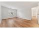 Bedroom with hardwood floors, white walls, and window at 3600 S Pierce St # 1-104, Lakewood, CO 80235