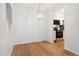 Well-lit dining area next to an updated kitchen and large window with blinds at 3600 S Pierce St # 1-104, Lakewood, CO 80235