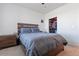 Spacious main bedroom with a walk-in closet and neutral tones at 2682 S Cathay Way # 307, Aurora, CO 80013