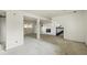 Unfinished basement featuring white-painted brick and staircase with great potential for customization at 16325 E Alabama Dr, Aurora, CO 80017