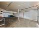 Spacious two-car garage with ample storage and a work area providing room for projects and parking at 16325 E Alabama Dr, Aurora, CO 80017
