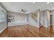 Large living room features hardwood floors and a staircase leading to the upper level at 3367 Dove Valley Pl, Castle Rock, CO 80108