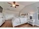 Serene main bedroom features hardwood floors, ample space, and natural light at 3367 Dove Valley Pl, Castle Rock, CO 80108