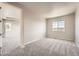 Comfortable bedroom with ample natural light and plush carpeting, creating a relaxing and inviting atmosphere at 6612 S Muscadine Ct, Aurora, CO 80016