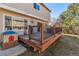 A spacious backyard deck featuring black metal railings and outdoor seating space at 19823 E 58Th Ave, Aurora, CO 80019