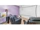 Cozy basement with comfortable seating, a projector screen, and accent lighting at 19823 E 58Th Ave, Aurora, CO 80019