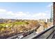 Expansive balcony offering serene views of the park and a vibrant city neighborhood at 1610 Little Raven St # 502, Denver, CO 80202
