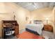 Bedroom featuring a comfortable bed, desk, and modern decor at 1610 Little Raven St # 502, Denver, CO 80202