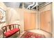 Hallway with neutral paint, artwork, and a stylish bench seat with decor and closet at 1610 Little Raven St # 502, Denver, CO 80202