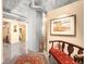 Hallway with neutral paint, artwork, and a stylish bench seat with decor at 1610 Little Raven St # 502, Denver, CO 80202