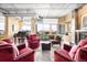 Comfortable seating area with a fireplace, piano, city views and modern decor at 1610 Little Raven St # 502, Denver, CO 80202