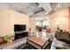 Bright living room with an open layout, modern decor, and large window offering great natural light at 1610 Little Raven St # 502, Denver, CO 80202