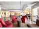 Open living space with a modern kitchen, comfortable seating, concrete ceiling and city views at 1610 Little Raven St # 502, Denver, CO 80202