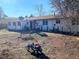 View of the backyard featuring a wagon at 3190 S Joplin Ct, Aurora, CO 80013