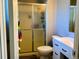Bathroom featuring a shower and a sink with a white vanity at 3190 S Joplin Ct, Aurora, CO 80013