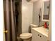 Bathroom featuring shower with curtain, toilet, and vanity at 3190 S Joplin Ct, Aurora, CO 80013