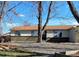 Attractive single-story house featuring decorative rock landscaping, and an inviting front porch at 3190 S Joplin Ct, Aurora, CO 80013