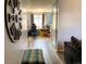 A view looking through to the home office with a gray color scheme and new flooring at 3190 S Joplin Ct, Aurora, CO 80013