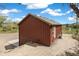 A rustic, cozy home with wood siding and a private, secluded setting at 826 Meadow Ln, Palmer Lake, CO 80133