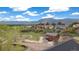 Charming multi-story home with picturesque mountain views and lush surrounding landscape at 826 Meadow Ln, Palmer Lake, CO 80133