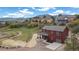 Lovely home with a covered front porch and convenient attached garage at 826 Meadow Ln, Palmer Lake, CO 80133