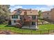 Spacious backyard view featuring a deck, a patio, and lush landscaping for outdoor living at 11149 Seton Pl, Westminster, CO 80031