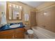 Functional bathroom with a vanity, tile flooring, and a combined bathtub and shower at 11149 Seton Pl, Westminster, CO 80031