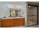 Bathroom with a glass-enclosed shower and a vanity at 11149 Seton Pl, Westminster, CO 80031