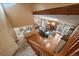 Bright and airy living room featuring vaulted ceilings, hardwood floors, and a cozy fireplace at 11149 Seton Pl, Westminster, CO 80031