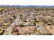 An aerial view showcasing the neighborhood and distant skyline at 2800 N Harrison St, Denver, CO 80205