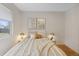 Charming bedroom with natural light, hardwood floors and modern decor at 2800 N Harrison St, Denver, CO 80205