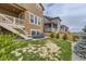 Well-maintained backyard featuring lush grass and landscaping at 8982 Spaulding St, Parker, CO 80134