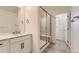 Modern bathroom with a glass-enclosed shower and sleek vanity at 8982 Spaulding St, Parker, CO 80134