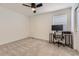 Bedroom with neutral carpet and a desk at 8982 Spaulding St, Parker, CO 80134