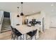 Contemporary kitchen featuring an island with seating, modern appliances, and stylish pendant lights at 8982 Spaulding St, Parker, CO 80134
