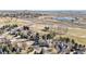 Scenic aerial view of the homes in a community adjacent to the expansive golf course at 6406 Eagle Ct, Longmont, CO 80503
